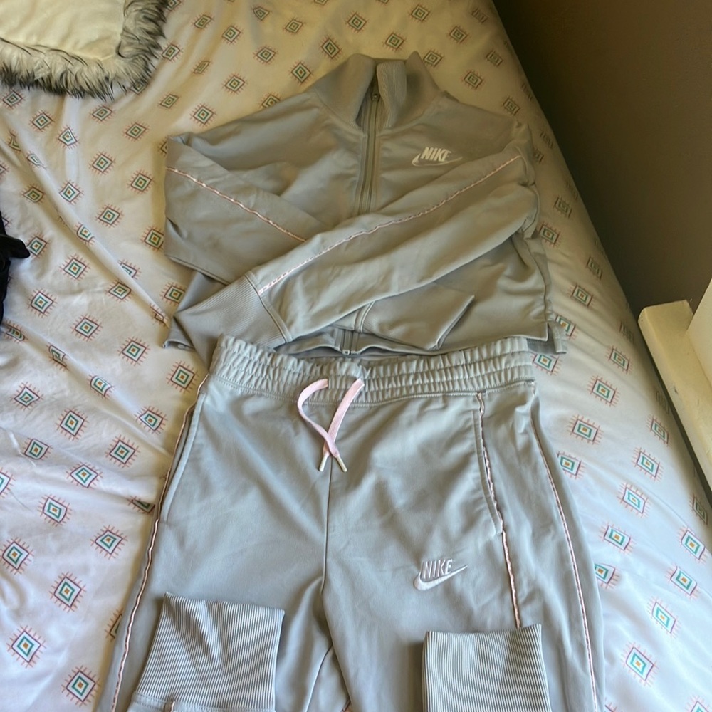 Pink and grey Nike sweat suit